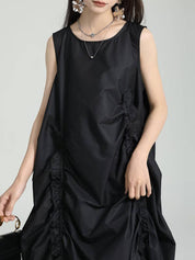 Loose Sleeveless Asymmetric Elasticity Pleated Solid Color Round-Neck Maxi Dresses